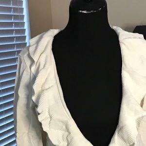 Women’s cream ruffle front sweater.